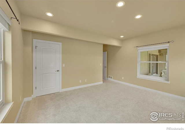 8406 Spinnaker Bay Dr, Windsor, CO 80528 - carpeted spare room featuring recessed lighting