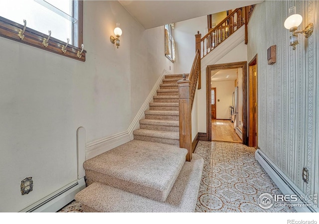 1906 Miner St, Idaho Springs, CO 80452 - stairs with baseboard heating and wallpapered walls