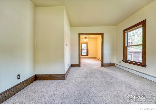 1906 Miner St, Idaho Springs, CO 80452 - carpeted empty room with baseboards and baseboard heating