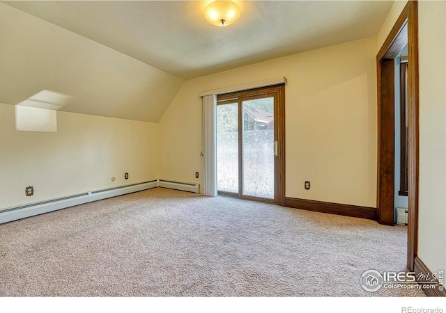 1906 Miner St, Idaho Springs, CO 80452 - additional living space with carpet, vaulted ceiling, a baseboard heating unit, and baseboard heating