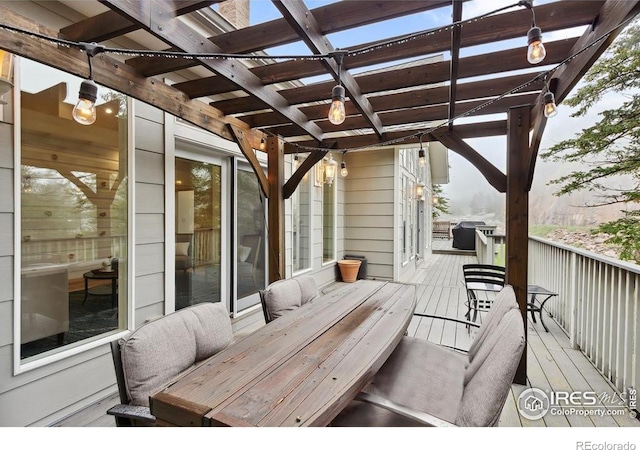 11042 N Saint Vrain Dr, Lyons, CO 80540 - wooden terrace featuring a pergola and outdoor dining area