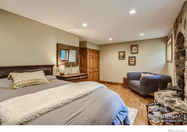 148 Granite Dr, Boulder, CO 80302 - bedroom with light wood-style flooring and recessed lighting