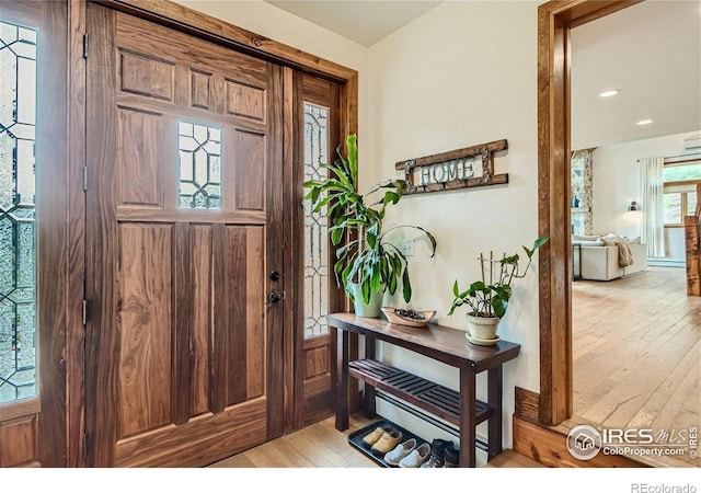 148 Granite Dr, Boulder, CO 80302 - entryway with light wood finished floors and recessed lighting