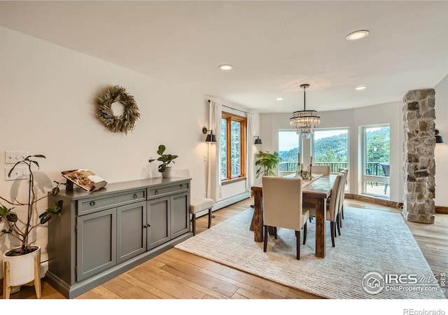 148 Granite Dr, Boulder, CO 80302 - dining room with a chandelier, light wood finished floors, recessed lighting, and baseboard heating