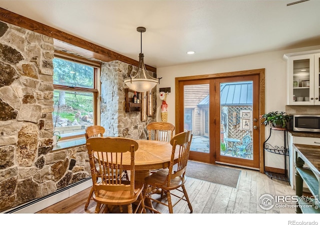 148 Granite Dr, Boulder, CO 80302 - dining room with light wood-type flooring and baseboard heating