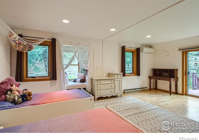148 Granite Dr, Boulder, CO 80302 - bedroom with a wall mounted air conditioner, access to exterior, baseboard heating, wood finished floors, and recessed lighting