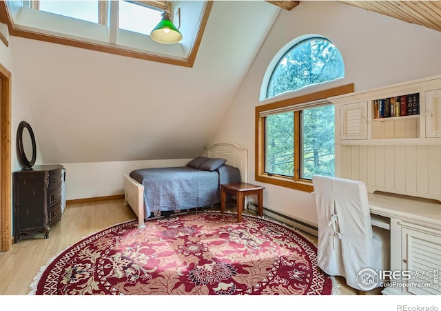 148 Granite Dr, Boulder, CO 80302 - bedroom featuring lofted ceiling, light wood finished floors, and a baseboard radiator