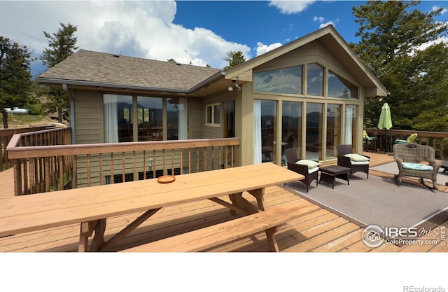 118 Alpine Dr, Estes Park, CO 80517 - wooden deck featuring a sunroom