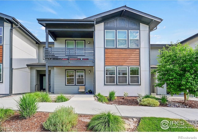 551 Vicot Way Unit D, Fort Collins, CO 80524 - view of front of house featuring a balcony and covered porch