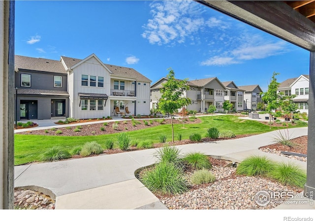 551 Vicot Way Unit D, Fort Collins, CO 80524 - view of home's community with a residential view and a lawn
