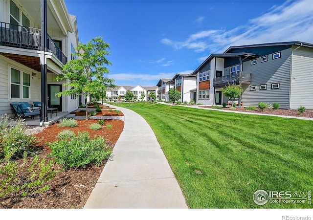 551 Vicot Way Unit D, Fort Collins, CO 80524 - surrounding community with a residential view and a yard