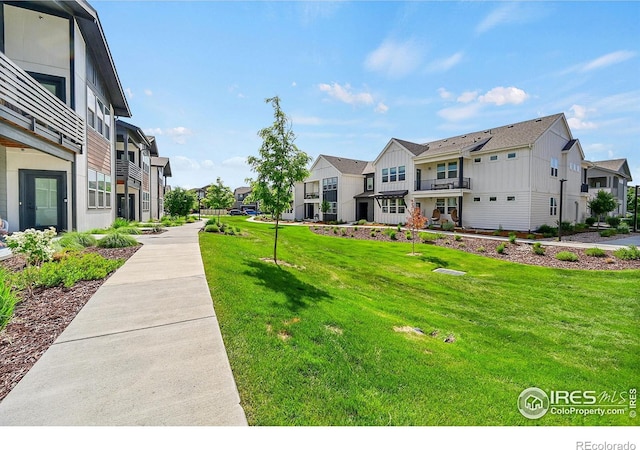 551 Vicot Way Unit D, Fort Collins, CO 80524 - surrounding community featuring a residential view and a yard