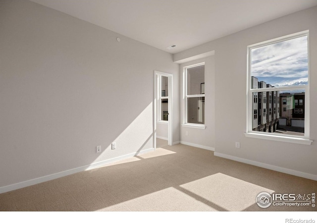 362 Promenade Dr, Superior, CO 80027 - carpeted empty room with baseboards