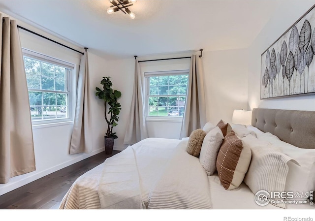 3250 Oneal Cir Unit 10, Boulder, CO 80301 - bedroom featuring wood finished floors and baseboards