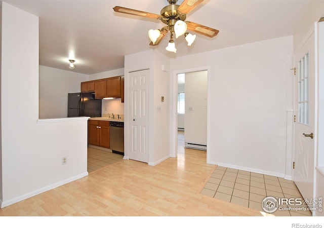 1601 W Swallow Rd Unit D, Fort Collins, CO 80526 - kitchen featuring freestanding refrigerator, stainless steel dishwasher, brown cabinetry, light wood-style floors, and a ceiling fan