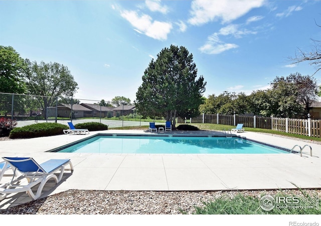 1601 W Swallow Rd Unit D, Fort Collins, CO 80526 - view of pool featuring a patio