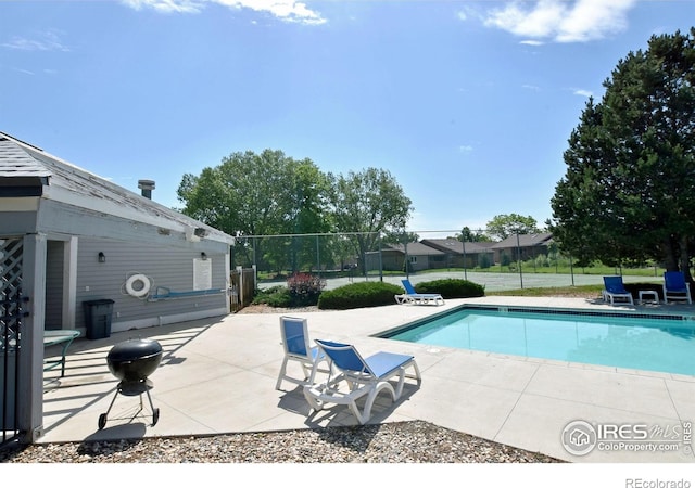 1601 W Swallow Rd Unit D, Fort Collins, CO 80526 - view of swimming pool with a patio area
