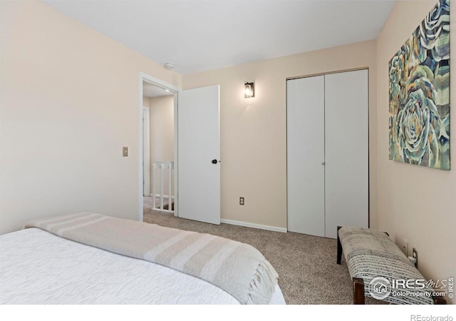 4863 W Moorhead Cir, Boulder, CO 80305 - carpeted bedroom featuring a closet and baseboards