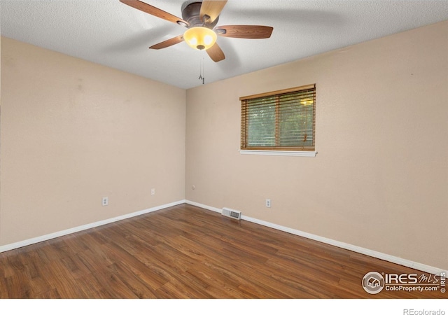 3207 Valmont St, Evans, CO 80620 - empty room featuring a ceiling fan and wood finished floors