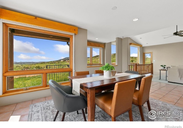 102 Bear Hollow Rd, Laporte, CO 80535 - dining room with light tile patterned floors, plenty of natural light, vaulted ceiling, ceiling fan, and recessed lighting