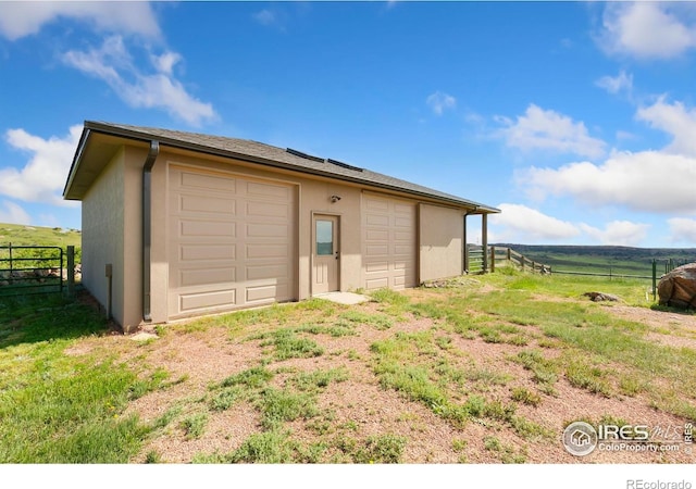 102 Bear Hollow Rd, Laporte, CO 80535 - garage featuring a view of rural / pastoral area