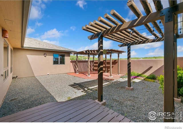 102 Bear Hollow Rd, Laporte, CO 80535 - wooden terrace featuring a pergola, a fenced backyard, and a patio area