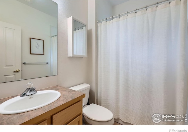 7196 Christopher Ct, Niwot, CO 80503 - full bathroom featuring vanity and toilet