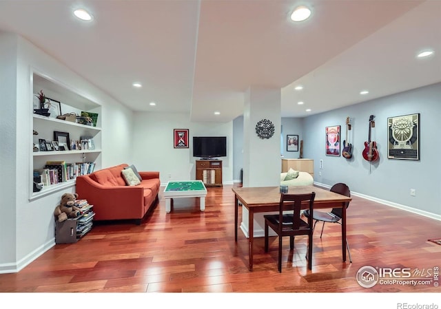 7196 Christopher Ct, Niwot, CO 80503 - dining area with wood finished floors, recessed lighting, and built in shelves