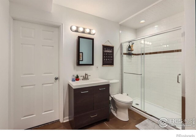 7196 Christopher Ct, Niwot, CO 80503 - full bathroom with vanity, a stall shower, and tile patterned flooring