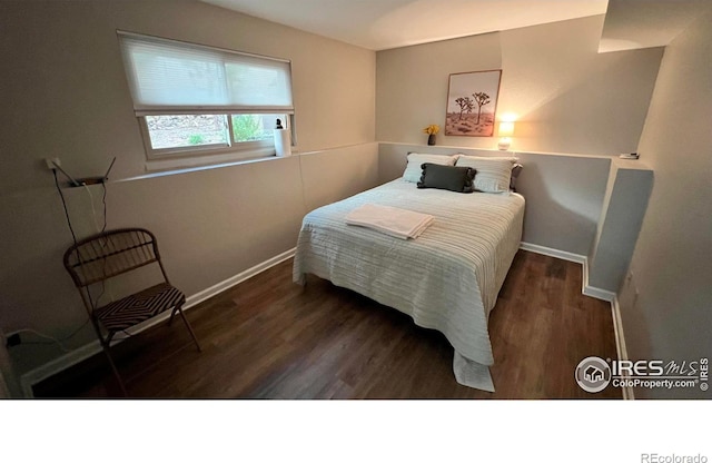1141 Fairway Club Cir # C3, Estes Park, CO 80517 - bedroom with wood finished floors and baseboards