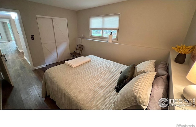 1141 Fairway Club Cir # C3, Estes Park, CO 80517 - bedroom with wood finished floors and a closet