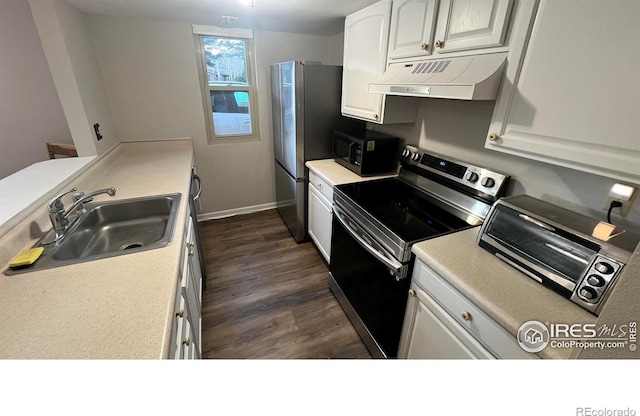 1141 Fairway Club Cir # C3, Estes Park, CO 80517 - kitchen featuring stainless steel electric stove, under cabinet range hood, black microwave, dark wood-type flooring, and white cabinets