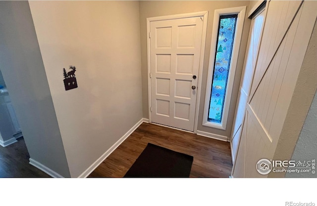 1141 Fairway Club Cir # C3, Estes Park, CO 80517 - foyer with dark wood-type flooring and baseboards