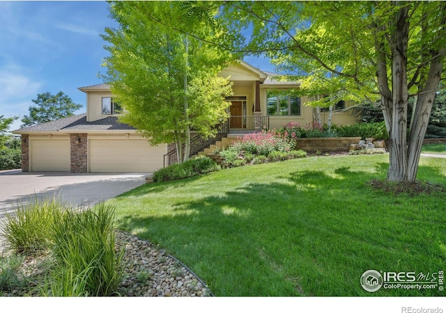 2156 Meander Rd, Windsor, CO 80550 - view of property hidden behind natural elements featuring driveway, a front yard, an attached garage, a porch, and stone siding