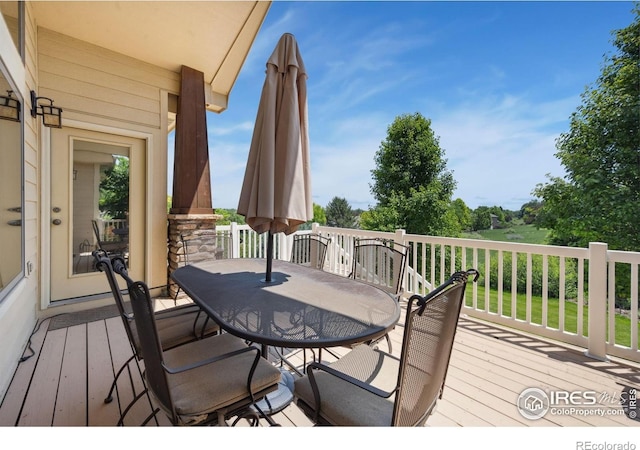 2156 Meander Rd, Windsor, CO 80550 - wooden deck featuring outdoor dining area