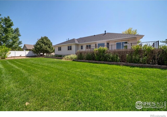 137 Reid Rd, Fort Morgan, CO 80701 - back of property featuring stucco siding