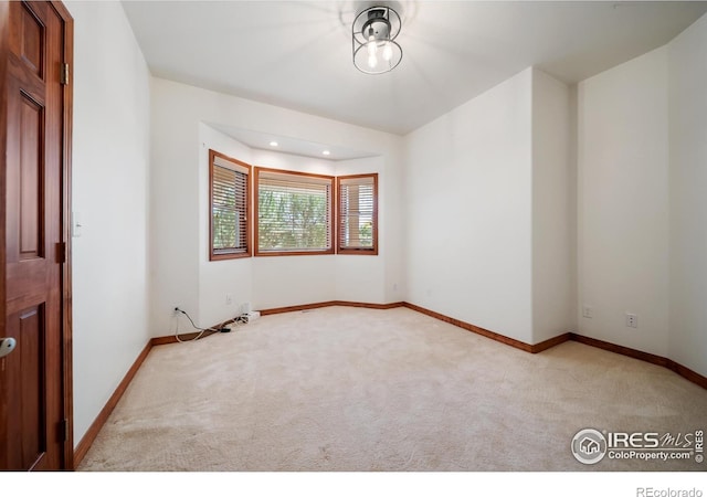 137 Reid Rd, Fort Morgan, CO 80701 - unfurnished room featuring carpet flooring and recessed lighting