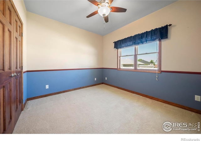 137 Reid Rd, Fort Morgan, CO 80701 - empty room featuring carpet and a ceiling fan