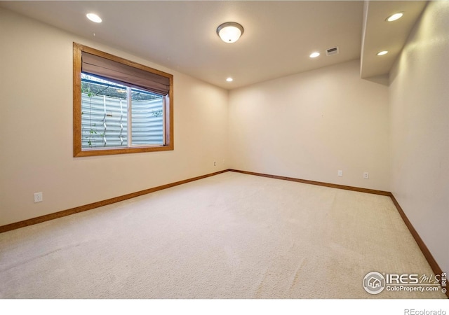 137 Reid Rd, Fort Morgan, CO 80701 - empty room featuring light colored carpet and recessed lighting