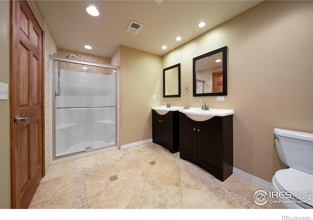 137 Reid Rd, Fort Morgan, CO 80701 - bathroom featuring vanity, recessed lighting, a stall shower, inlaid floor details, and tile patterned flooring