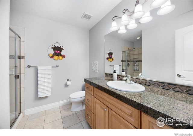 5424 Taylor Ln, Fort Collins, CO 80528 - bathroom with a stall shower, vanity, tile patterned floors, and a chandelier