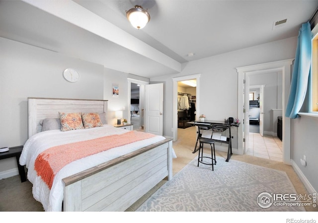 5424 Taylor Ln, Fort Collins, CO 80528 - bedroom with a walk in closet, light colored carpet, and a closet