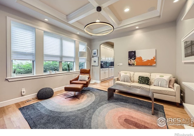 714 Skywalker Pt, Lafayette, CO 80026 - living area with light wood-type flooring, coffered ceiling, recessed lighting, beamed ceiling, and arched walkways