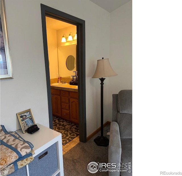 205 Timber Ridge Ct, Severance, CO 80550 - hallway featuring a sink