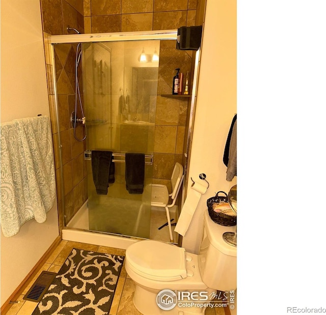 205 Timber Ridge Ct, Severance, CO 80550 - full bath featuring a shower stall and tile patterned flooring
