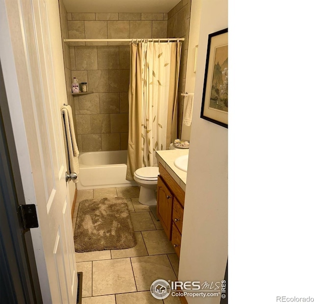 205 Timber Ridge Ct, Severance, CO 80550 - bathroom with tile patterned floors, vanity, and shower / bath combination with curtain