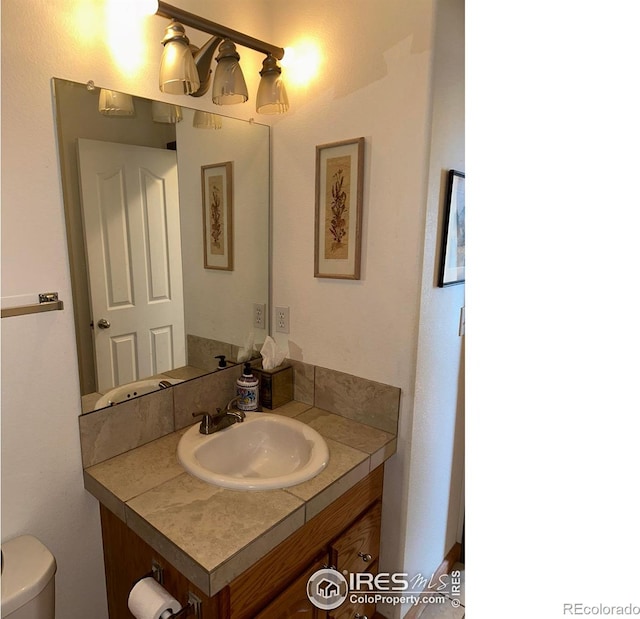 205 Timber Ridge Ct, Severance, CO 80550 - bathroom with vanity and toilet