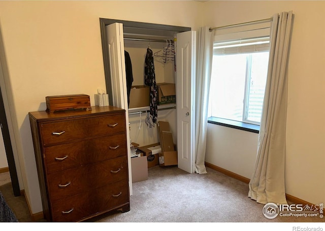 205 Timber Ridge Ct, Severance, CO 80550 - bedroom featuring light carpet and a closet