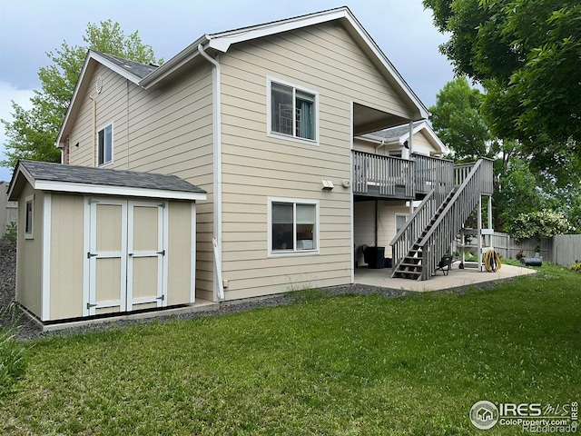 205 Timber Ridge Ct, Severance, CO 80550 - back of house featuring a storage shed, a patio, a deck, and stairway