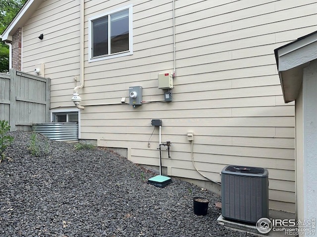 205 Timber Ridge Ct, Severance, CO 80550 - view of side of property with a central AC unit